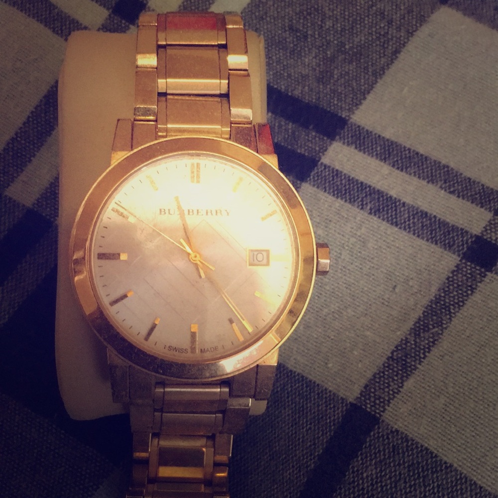Burbery watch with box and extra links